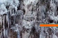 تصاویر زیبا و خیره کننده از چشم اندازهای برفی و آبشارهای یخ زده در چین