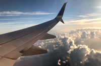 پرواز هواپیما ، پرواز هواپیمای مسافربری برفراز ابرهای زیبا