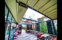 سقف متحرک تراس رستوران-سایبان کنترلی روفگاردن کافه رستوران-جدیدترین پوشش تاشو پشت بام باغ رستوران